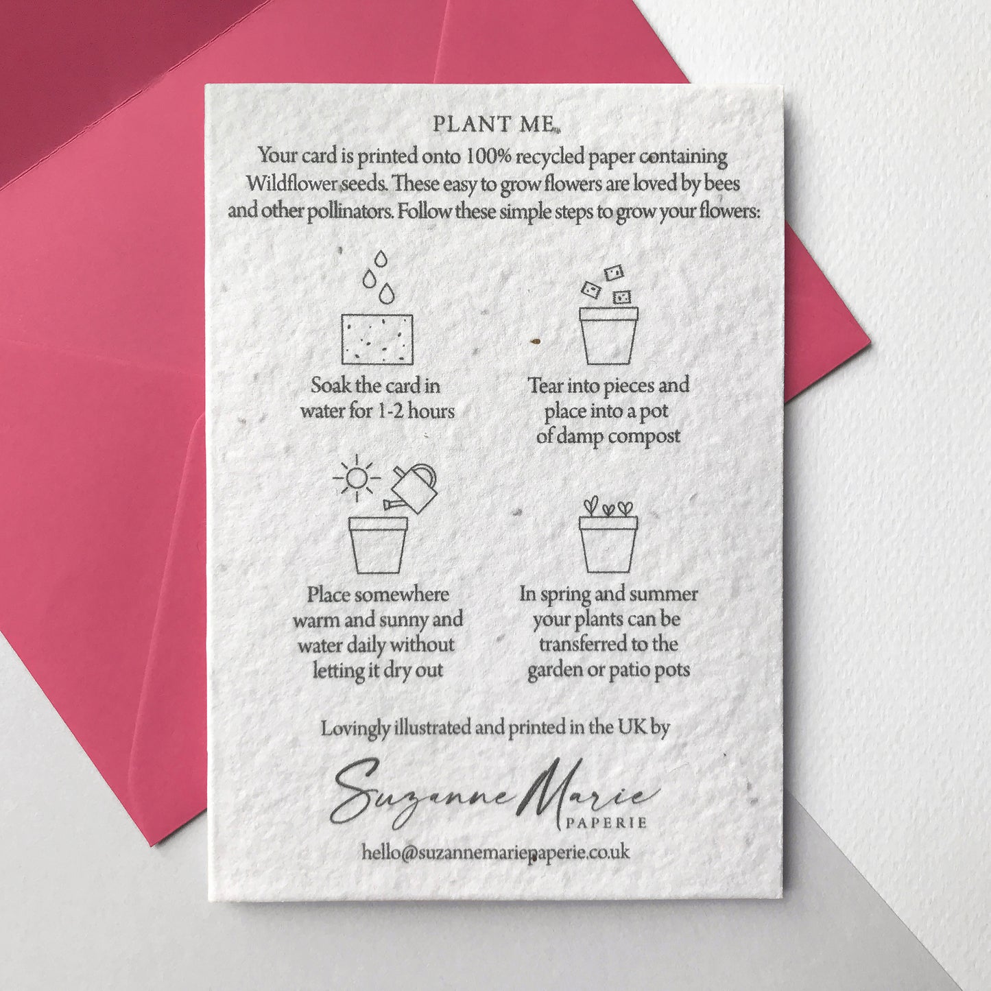 Image shows the back of the plantable seed paper anniversary card featuring easy to follow planting instructions by Suzanne Marie Paperie.