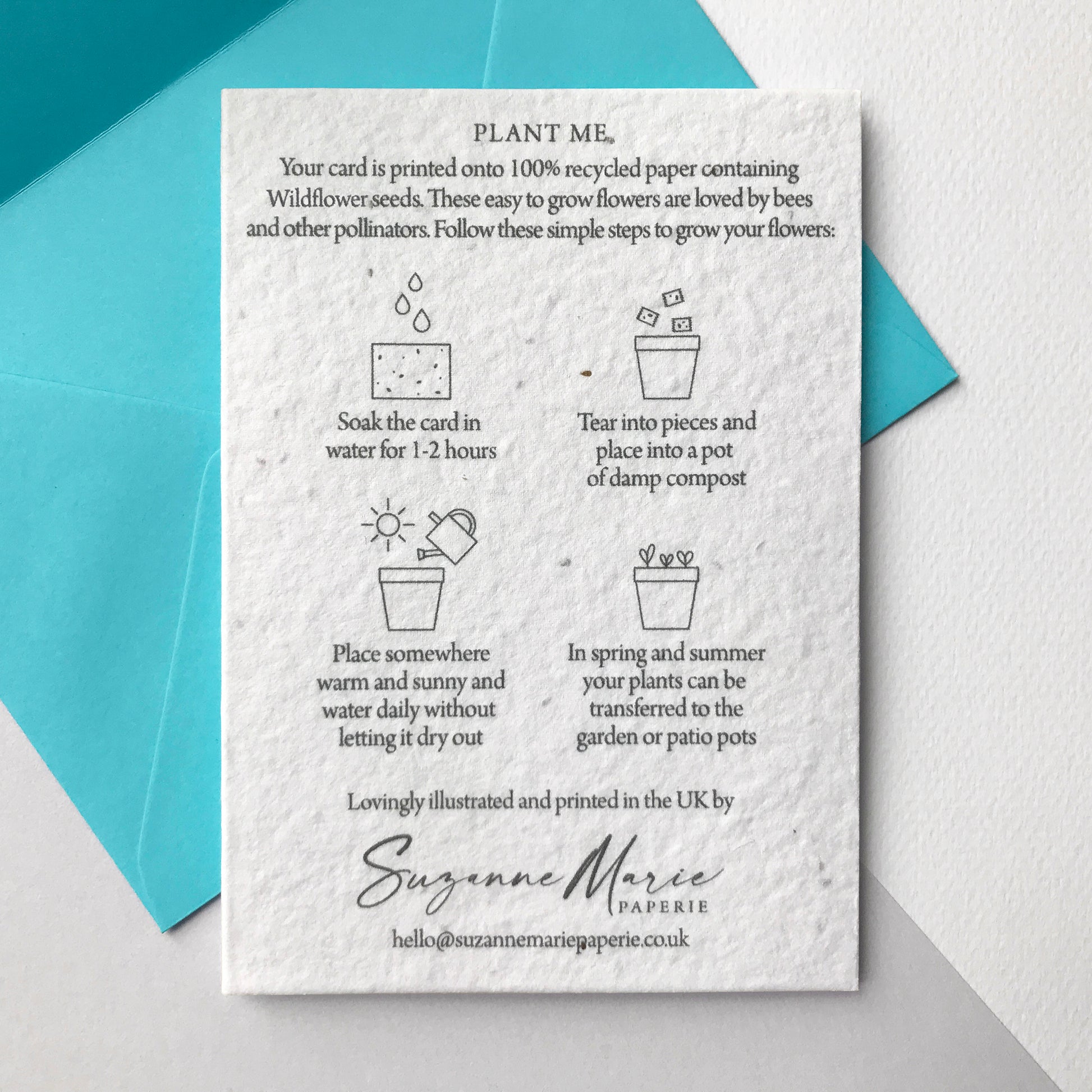 Image shows the back of the Bloom Cards plantable seed paper wedding congratulations card featuring easy to follow planting instructions by Suzanne Marie Paperie.